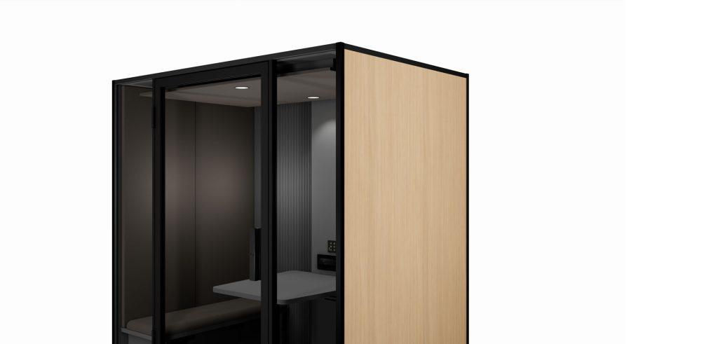 Cabine acoustique Indus avec panneau extérieur bois clair pour un design chaleureux en open space